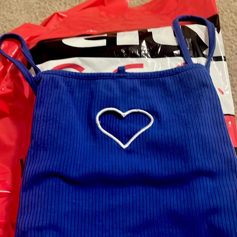 blue tank top with a heart in the middle